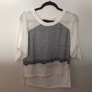 BCBG white blouse with black lace print detail